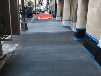 Sidewalk work under a shed, Midtown East, NYC. Executive Building Systems project.